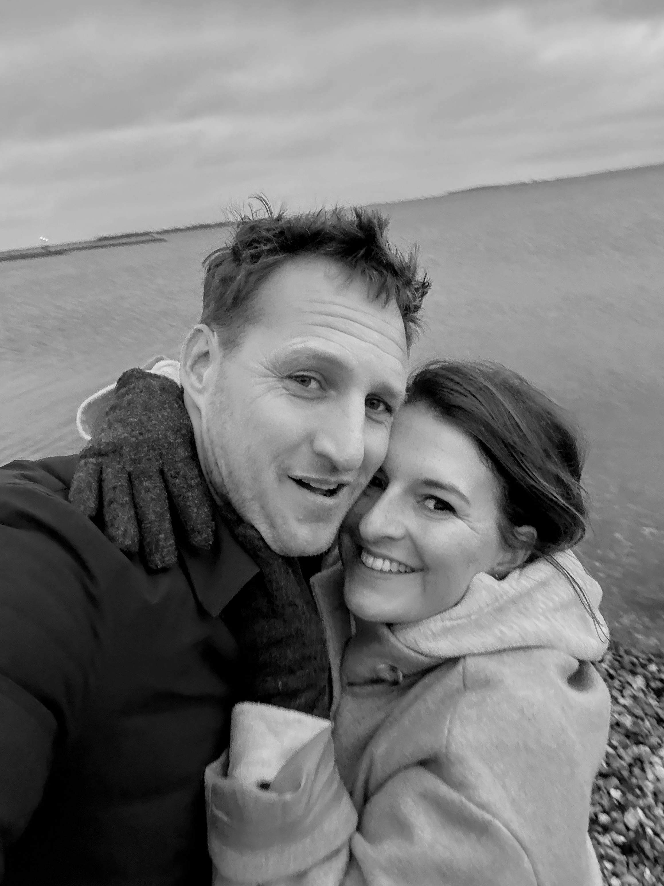 George and his wife on the beach